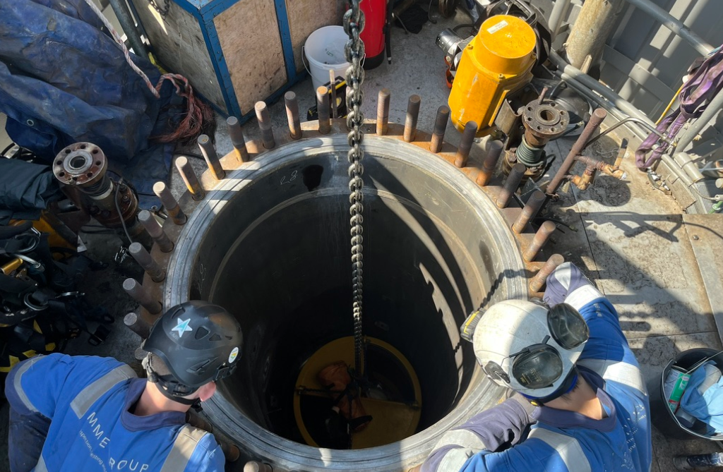 Confined space work demands meticulous hazard management — an extra layer of risk on top of working at height Technicians supervising confined space entry into an industrial vessel